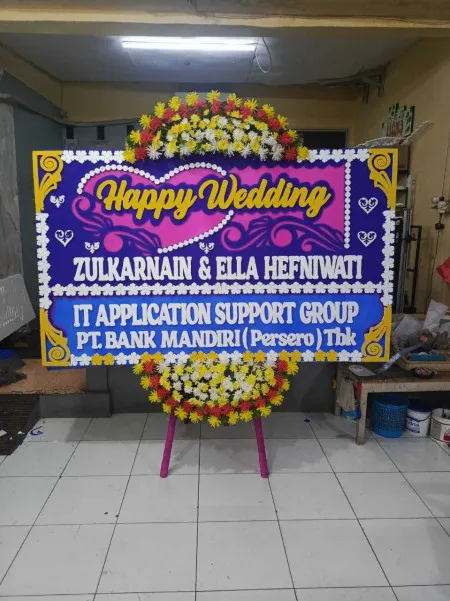 Papan Bunga Axa Tower