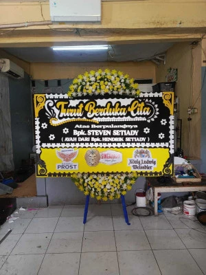 Papan Bunga di Axa Tower