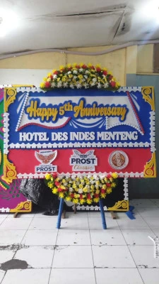 Papan Bunga di Axa Tower
