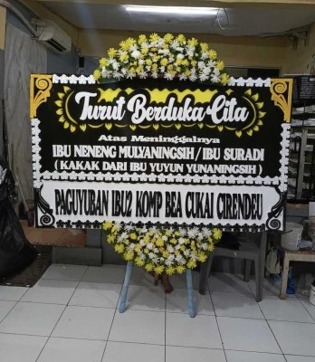 Papan Bunga di Axa Tower